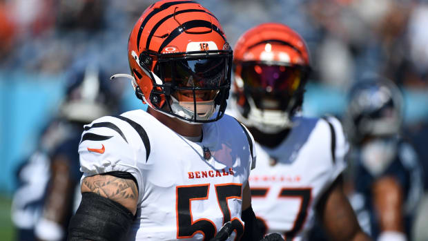 Oct 1, 2023; Nashville, Tennessee, USA; Cincinnati Bengals linebacker Logan Wilson (55) and linebacker Germaine Pratt (57) warm up before the game against the Tennessee Titans at Nissan Stadium. Mandatory Credit: Christopher Hanewinckel-USA TODAY Sports  